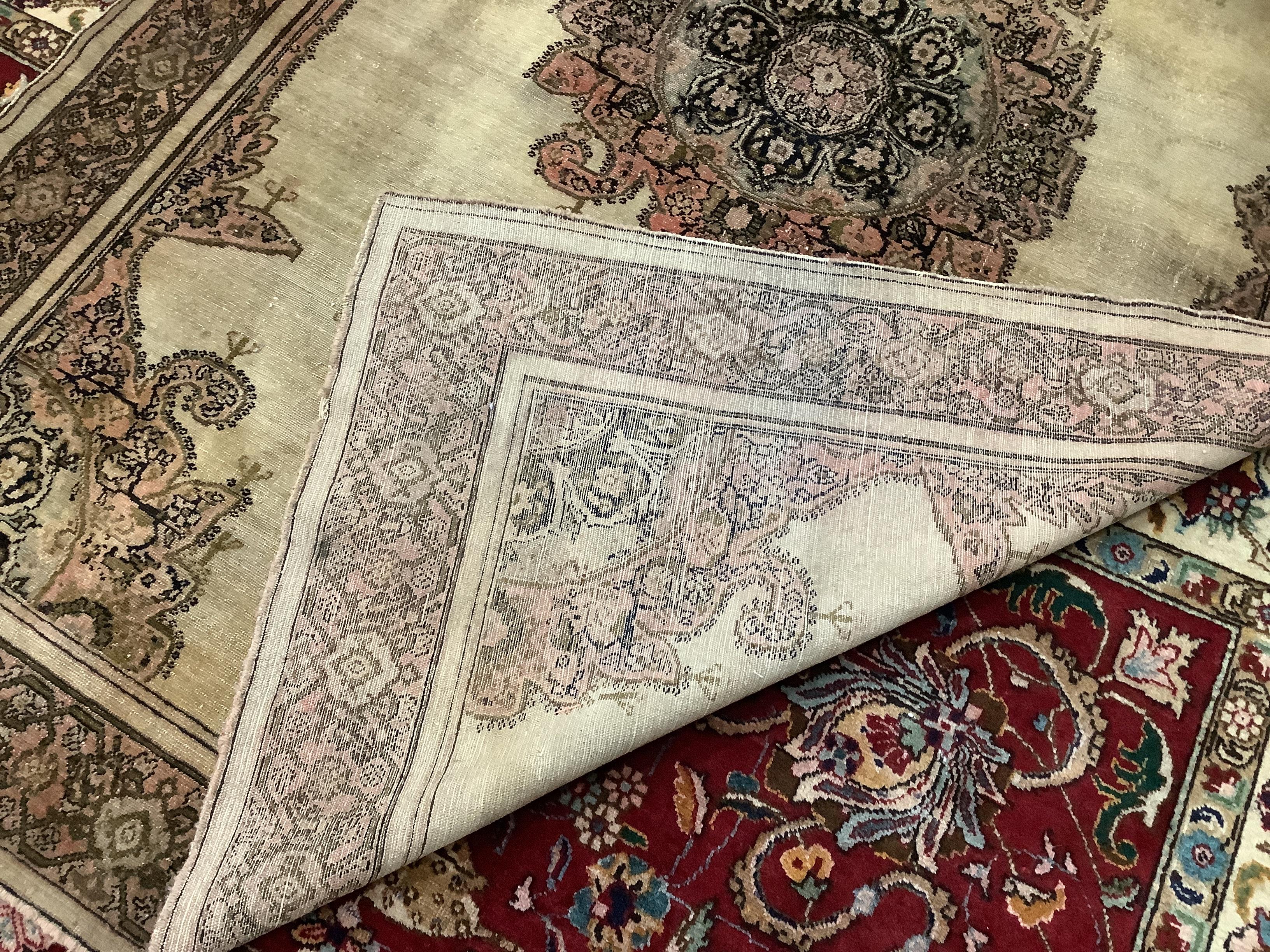 A Malayan ivory ground rug, 210 x 138cm